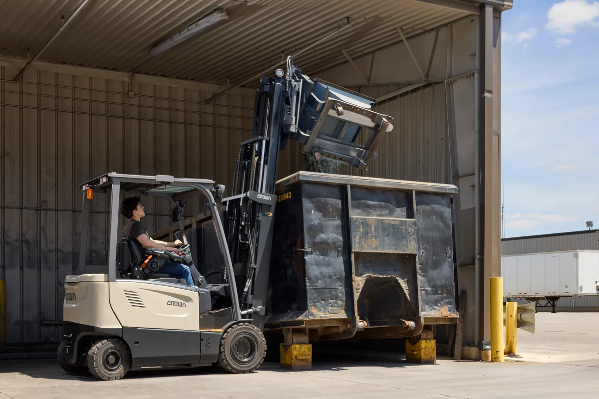 Crown internal combustion forklift handling a load outdoors