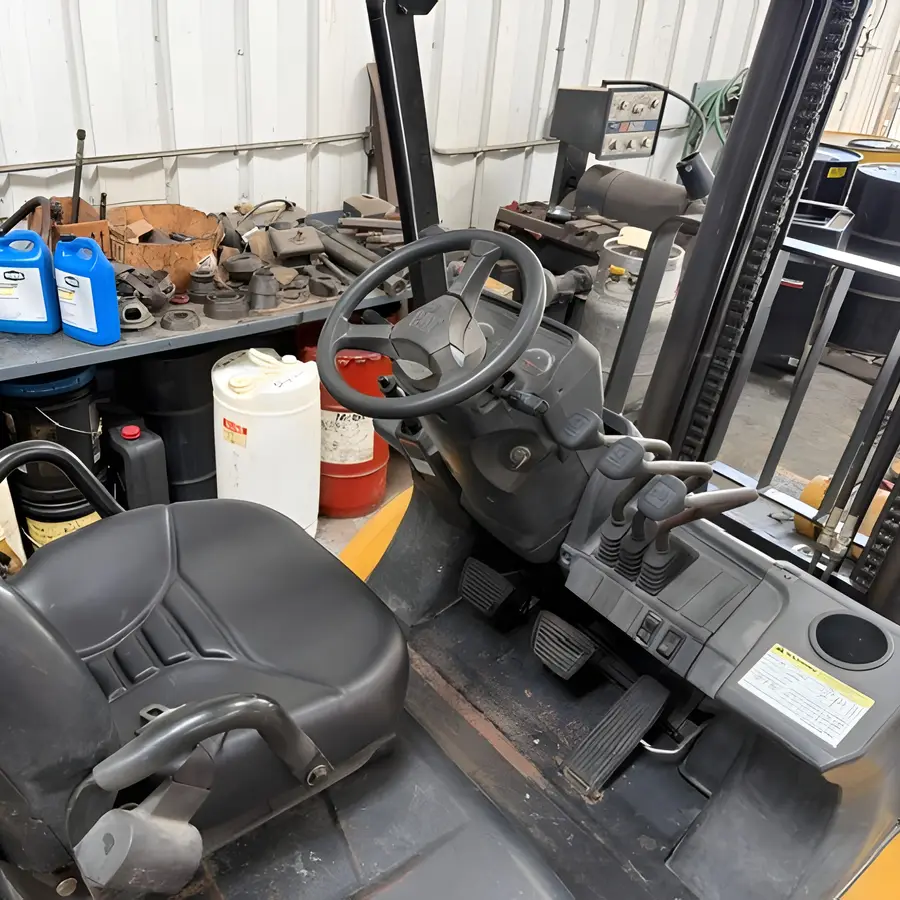 Seat and controls of the used Cat forklift